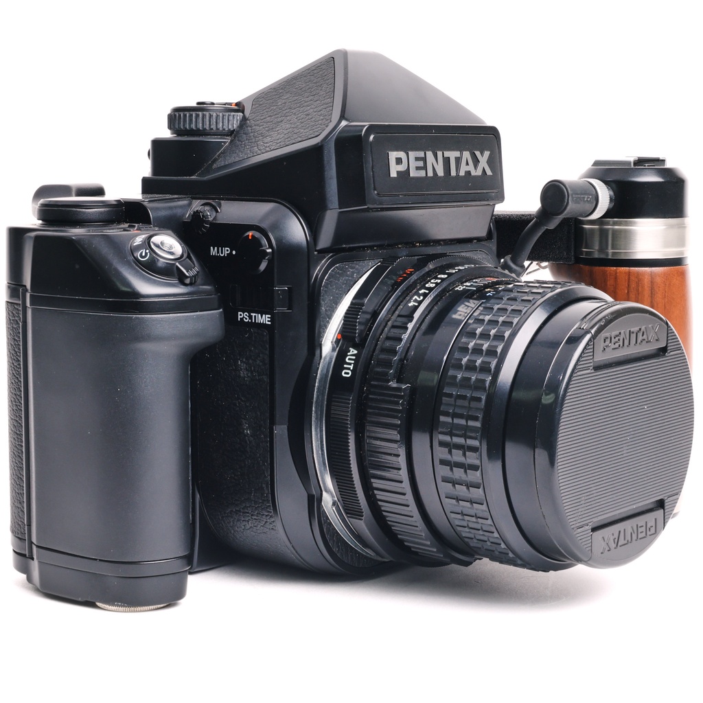 Pentax 67 II body w/- wooden grip + original strap + 105mm f